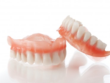 bigstock-Denture-close-up-25474094